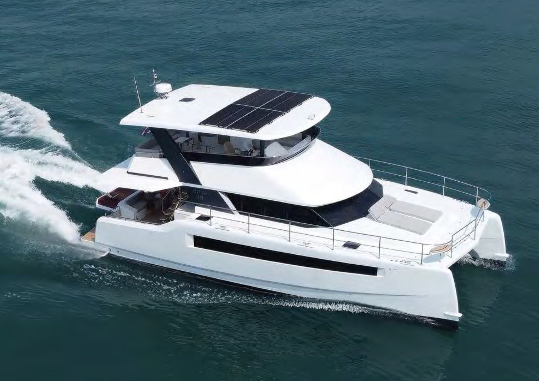 The 2024 Cora 48 Power Catamaran – Aerial view underway with solar panels on the hardtop – Avelis Yachts Singapore