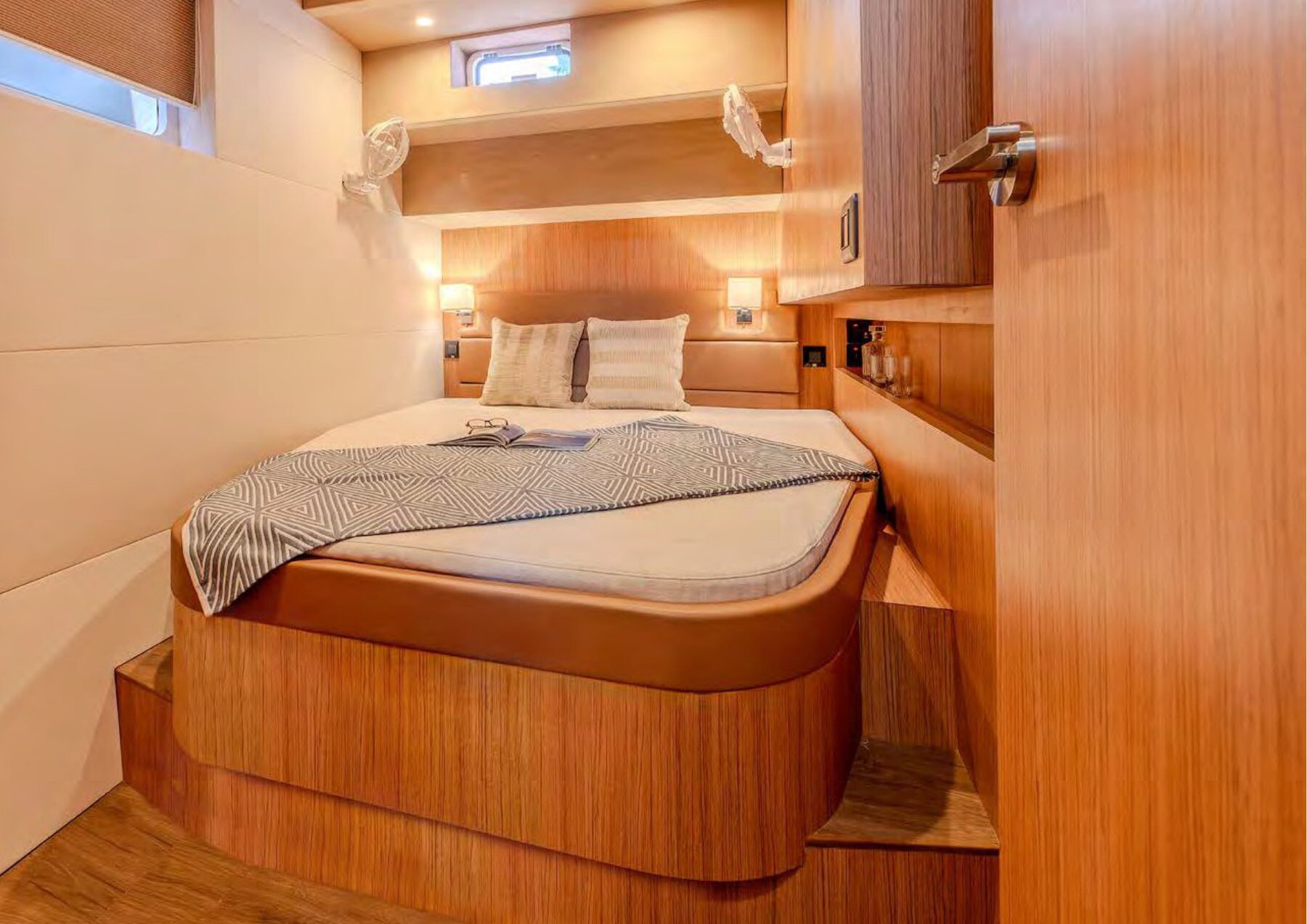 The 2024 Cora 48 Power Catamaran – Guest cabin with double berth and reading lights – Avelis Yachts Singapore