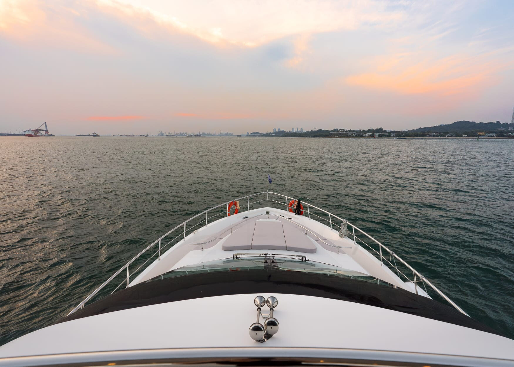 The Aquitalia 68 Motor Yacht – Foredeck looking forward at sunset – Avelis Yachts Singapore