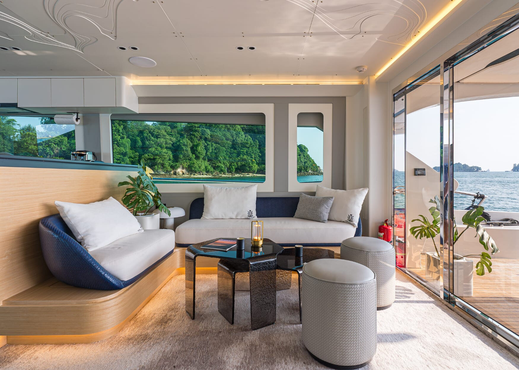 The Aquitalia 68 Motor Yacht – Main salon lounge with island views – Avelis Yachts Singapore