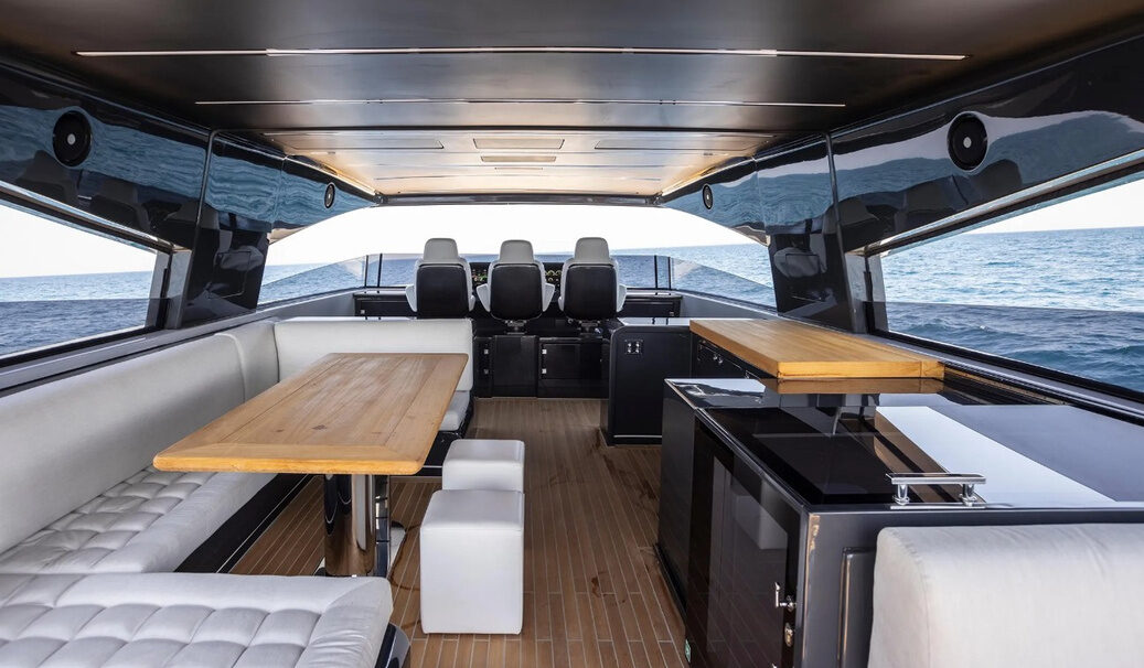 The Manda 72 Luxury Motor Yacht – Salon dining table and helm seats – Avelis Yachts Singapore